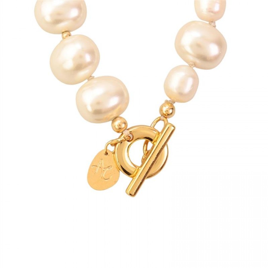 Pulseira Pérola Oval E Barroca Com Fecho T 